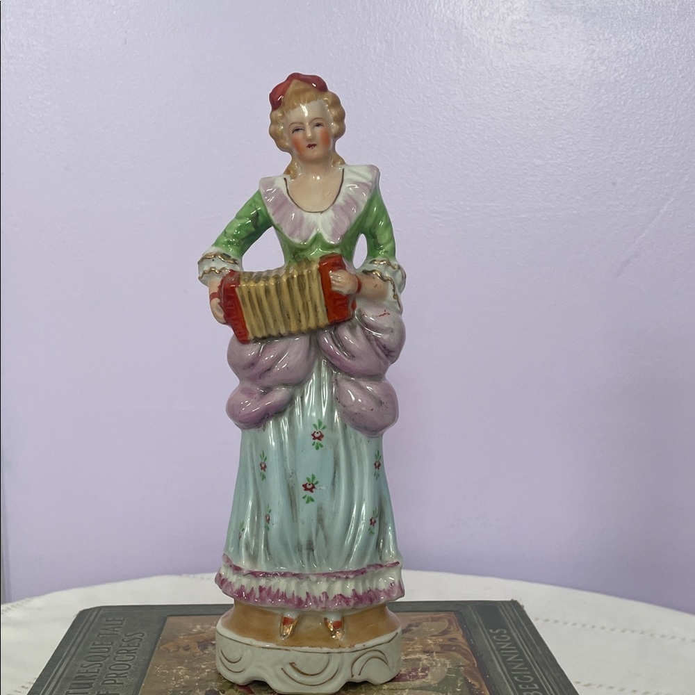 Vintage Porcelain Figurine with Accordion